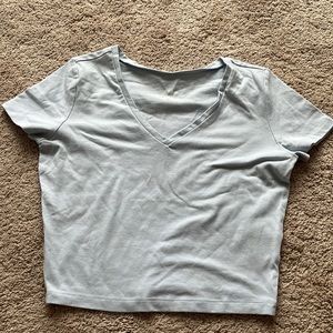 Light blue v neck crop top,  Size M